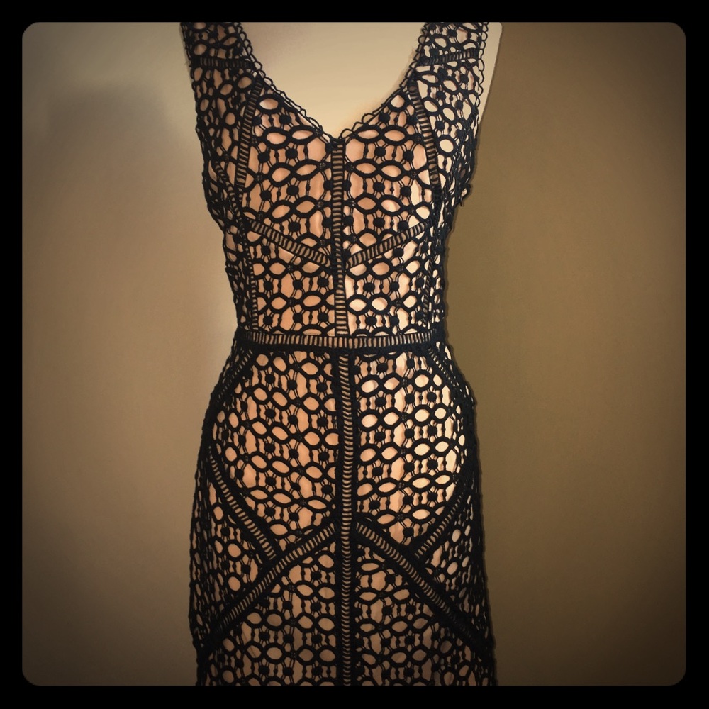 Black cocktail dress with intricate details
